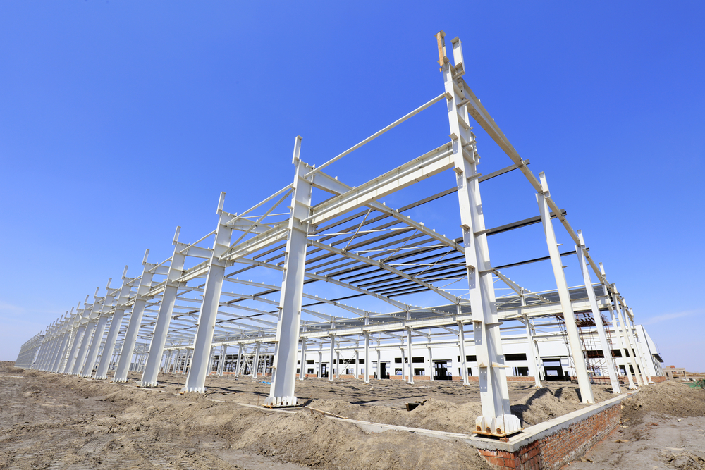 Steel,Girder,Truss,Under,Blue,Sky,,Closeup,Of,Photo